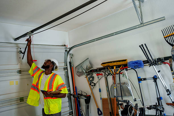 Professional Garage Door technician working in Winona Lake, IN